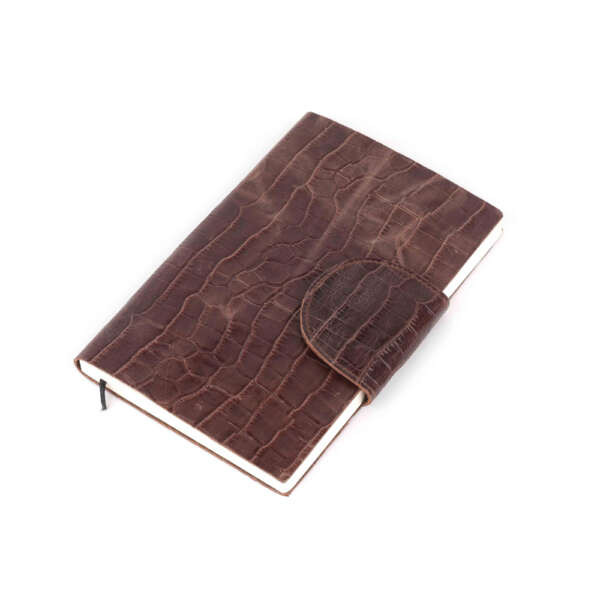 brown leather notebook